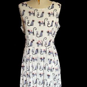 Light and airy Parisian cat ladies dress.